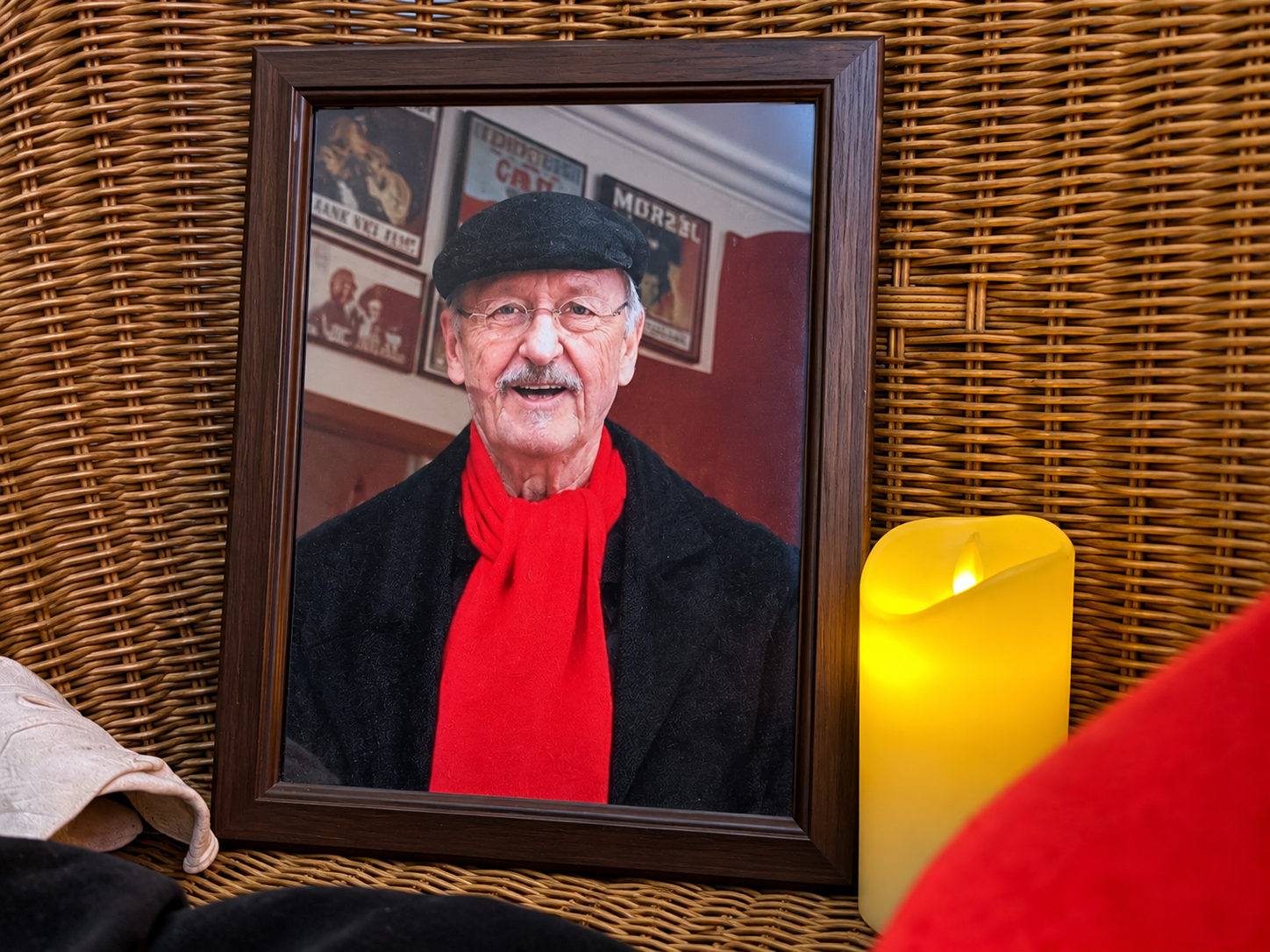 Gedenkort im OLi-Kino mit einem gerahmten Porträt von Wolfgang Heckmann.